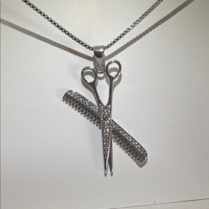 Silver necklace with shear/comb pendant
